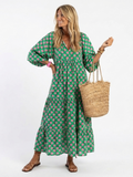 Fiora | Vestido midi con estampado floral, cuello en V y capas