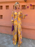 Mía | Vestido largo con estampado floral y escote profundo
