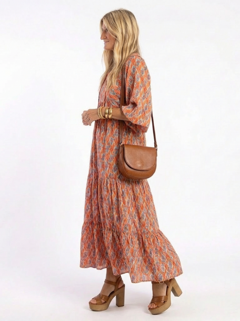 Chiara | Vestido midi con cuello en V, estratificado y estampado geometrico