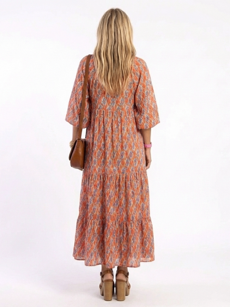 Chiara | Vestido midi con cuello en V, estratificado y estampado geometrico