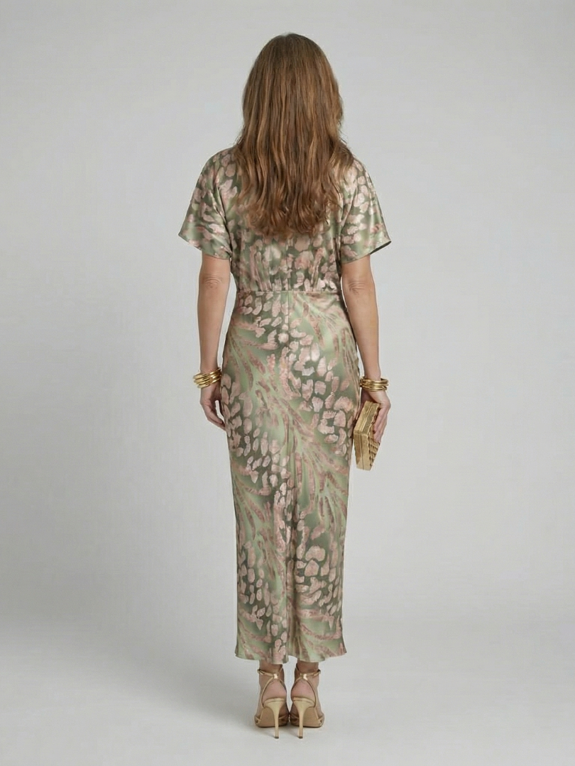 Coral | Vestido midi con estampado abstracto, cuello en V y cintura retorcida