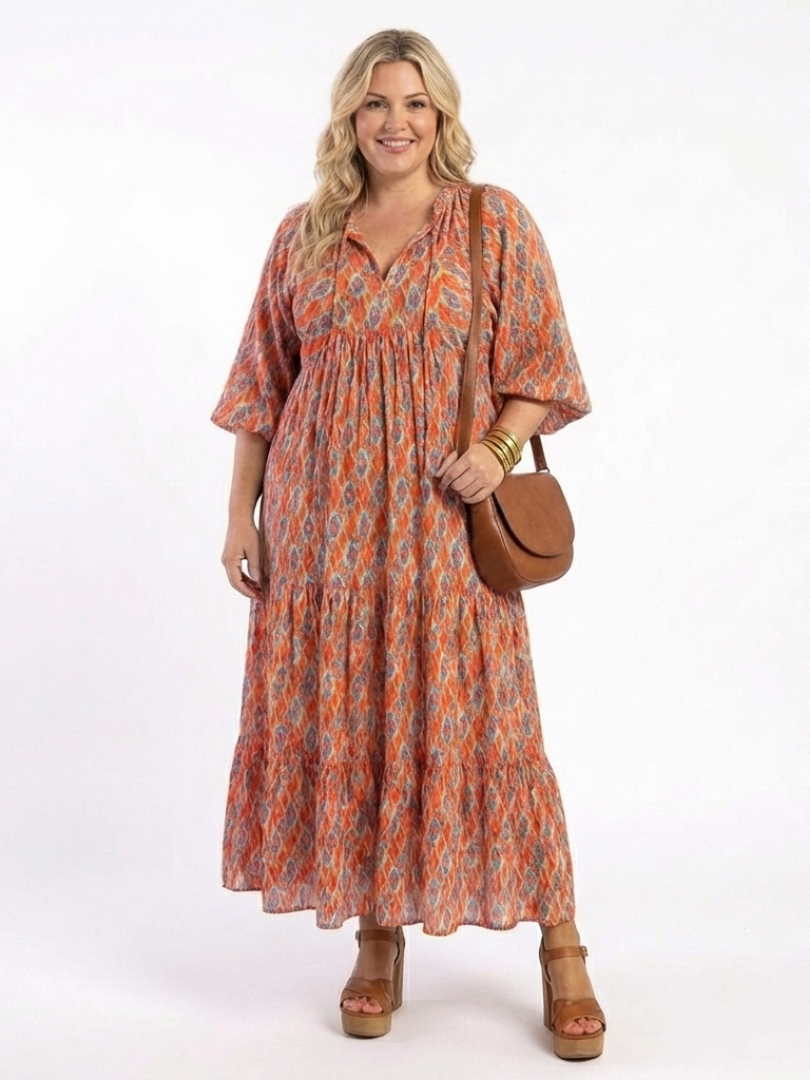 Chiara | Vestido midi con cuello en V, estratificado y estampado geometrico