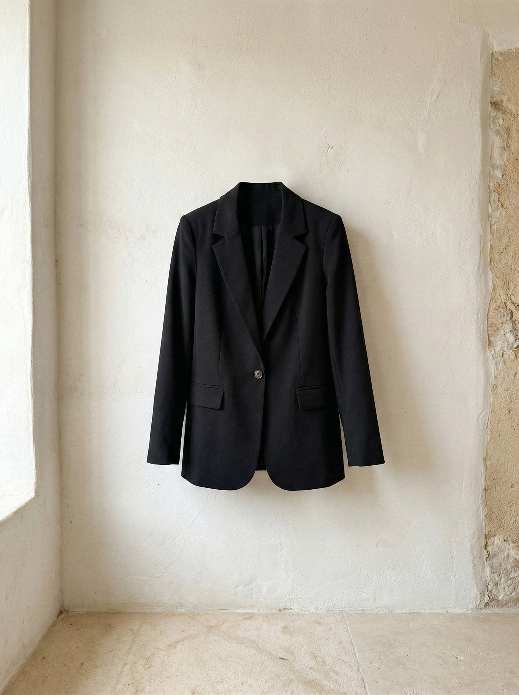 Blazer ejecutiva elegante con botón Carey